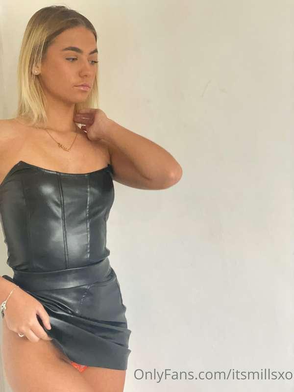 Little leather skirt keeps riding up🙈 oops 🧡