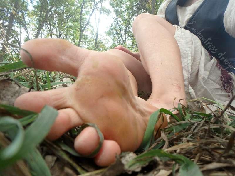 Taking a rest after walking barefoot through the prairie to ..