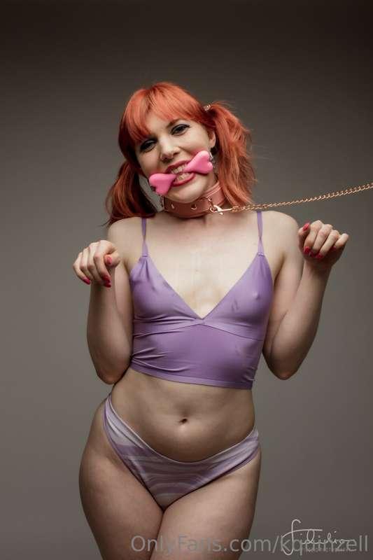 Being an adorable Kitty Pup with my new bone gag!  
Which pi..