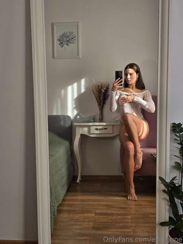 Dressed in pristine white with two smiles that radiate pure ..