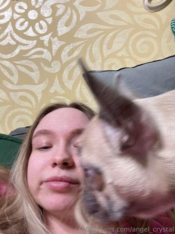 This is me with my friend’s pet, she is so active and playfu..