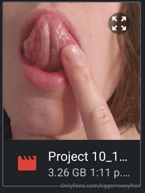 Oral fixation (close up face, tongue and mouth with dirty ta..