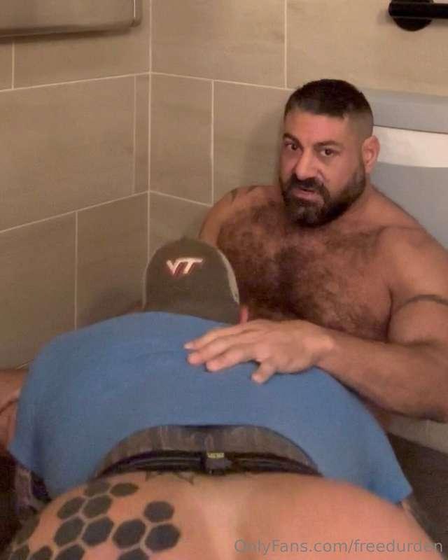 Getting used by this hunky daddy in the hotel lobby bathroom..