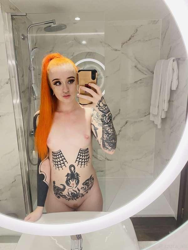 Hotel bathrooms always have the best lighting for some cheek..