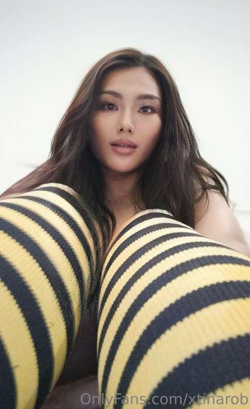 Little Miss Busy Bee trying to show off her cute stockings. ..