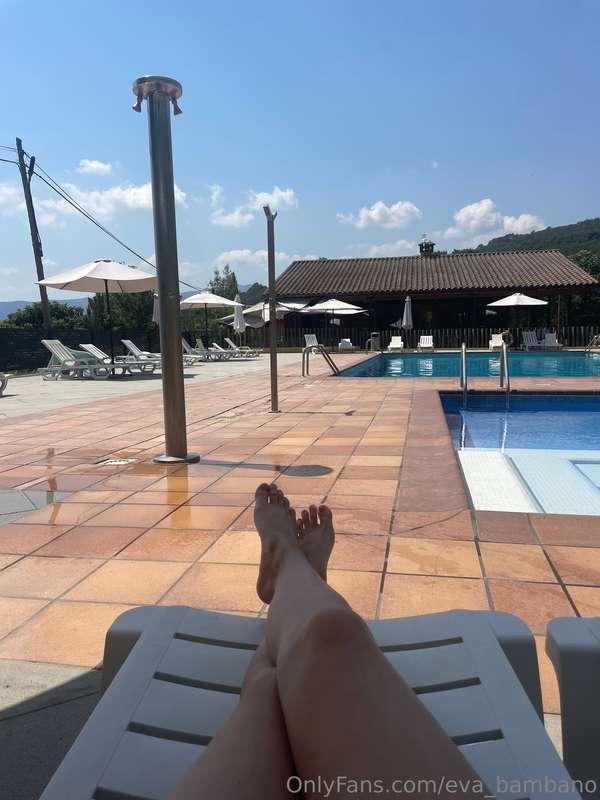 Lying by the pool, the sun sliding on my skin and the water ..