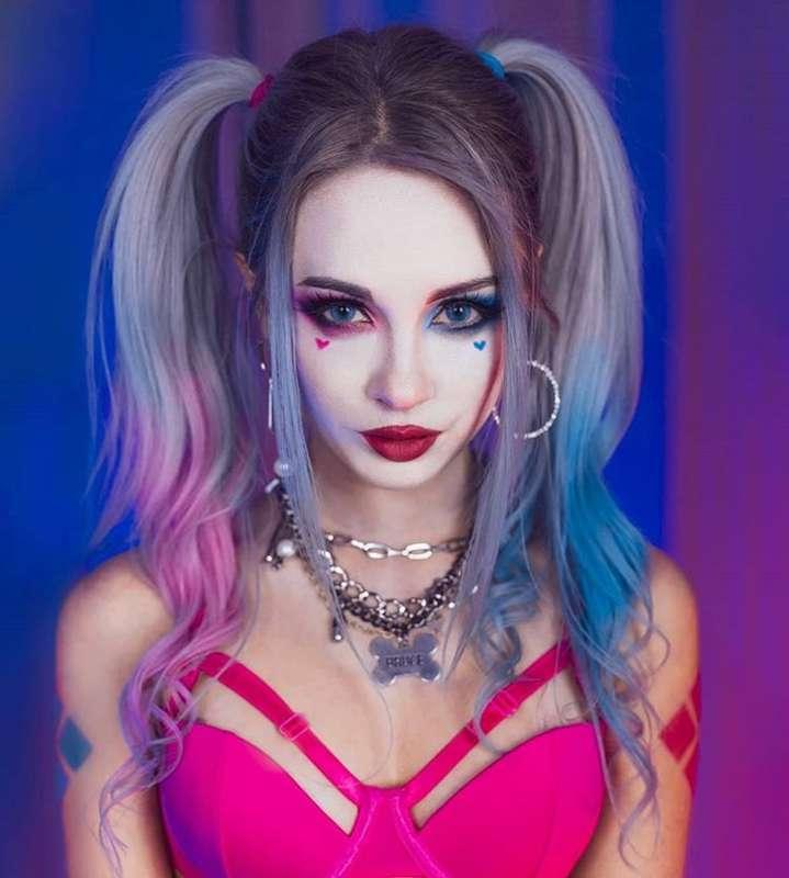 The ultimate triple threat? A cosplayer, gamer, and cat-love..