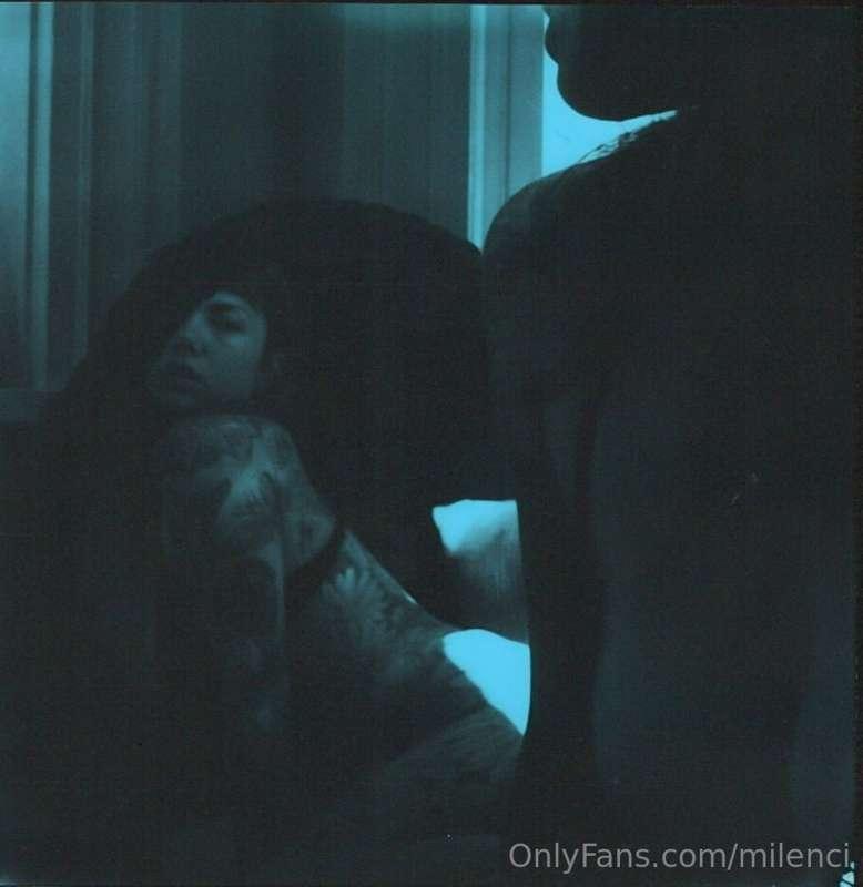 Mirrored self portraits shot on blue Polaroid film