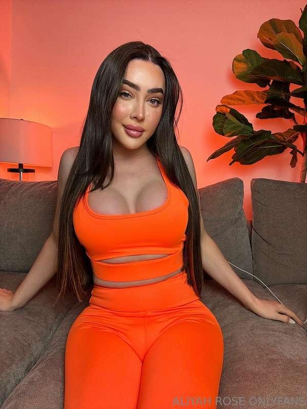 This orange suit makes everything pop, especially what’s und..