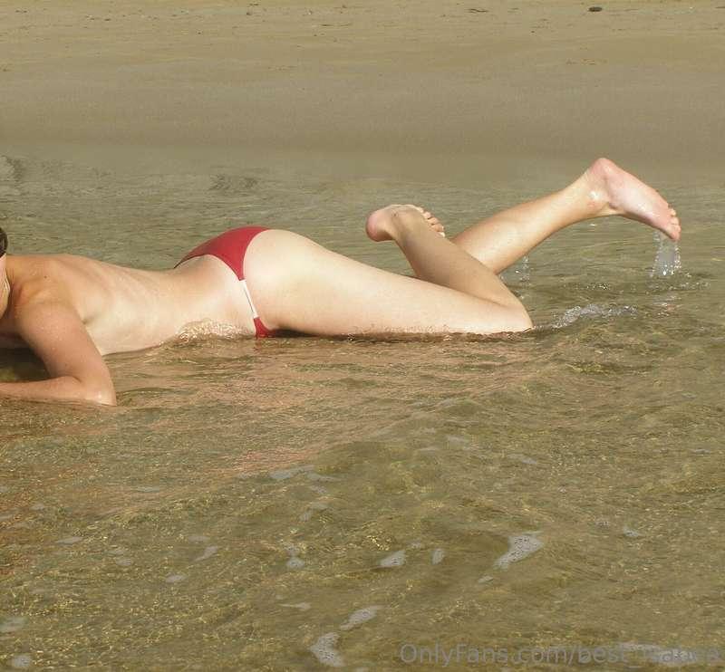 The beach, the sea and topless me lying on my belly. And san..