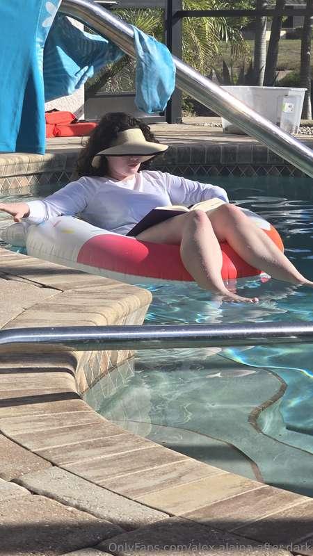 Watching Alex floating blissfully in the pool, lost in her b..