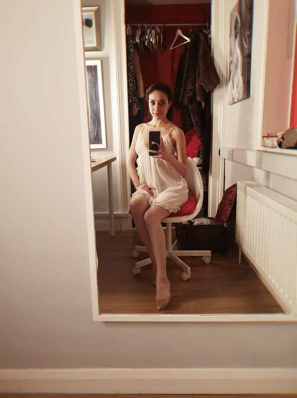 Getting ready for a boudoir style shoot in loose lacy linger..