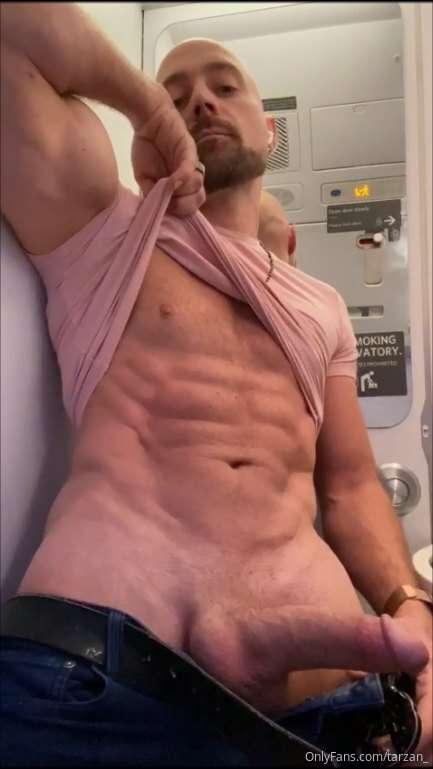 checking out the bathroom on the plane heading to Hawaii