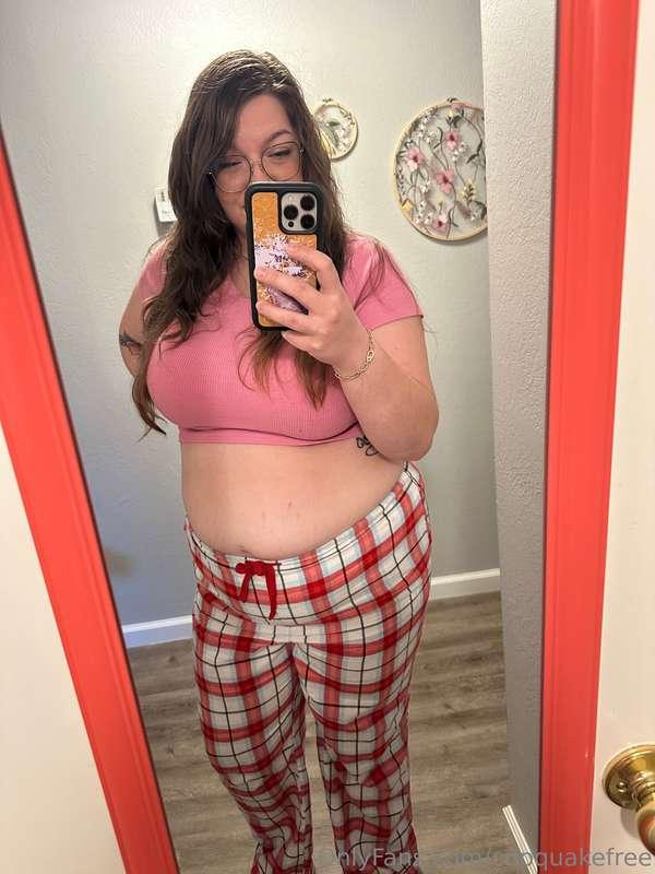 Vacuuming a couch while letting my big belly hang out. 