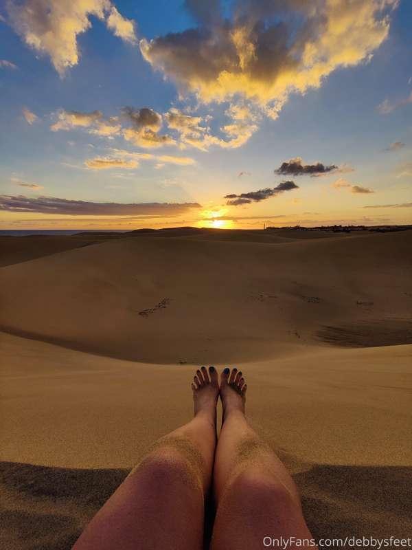 Take a look here my legs changing color at sunset on a sand ..