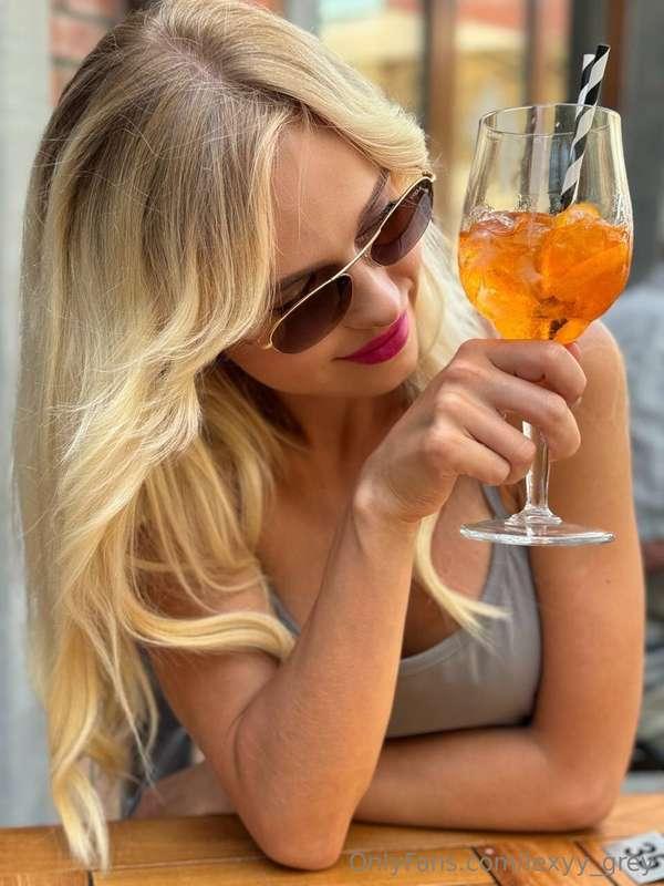 Sipping Aperol for the first time at a cozy café this mornin..