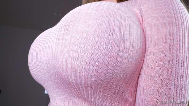 Slowly stripping off my cute pink sweater...bet you can't wa..