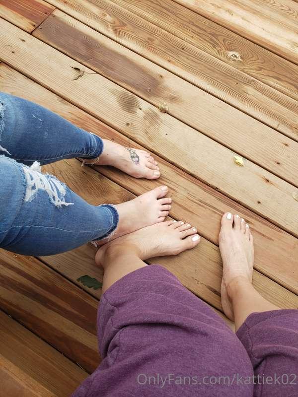 Comparing my size 14US with my older sister's size 11US feet..