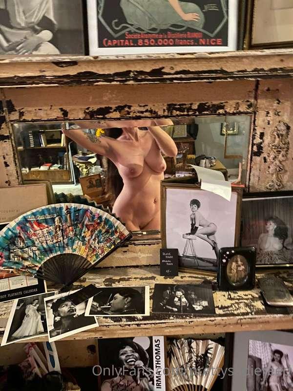 In good company

On the mantle are photos of New Orleans bur..