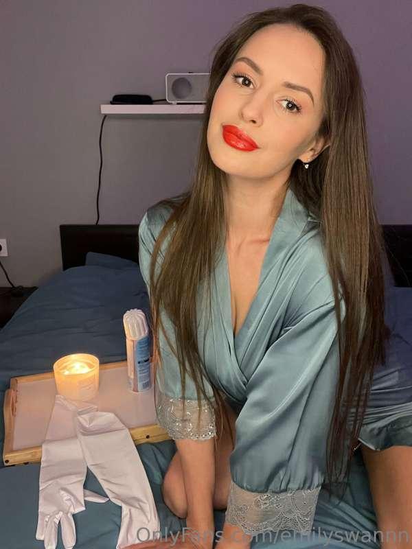 Cozy atmosphere, candles, cream, and Emily in sexy lingerie...