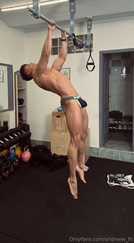 Hanging from the bar, body flexed, cock hard in my briefs if..