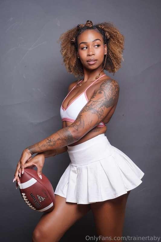All geared up and ready to score 💋🏈. Care to be my next touc..