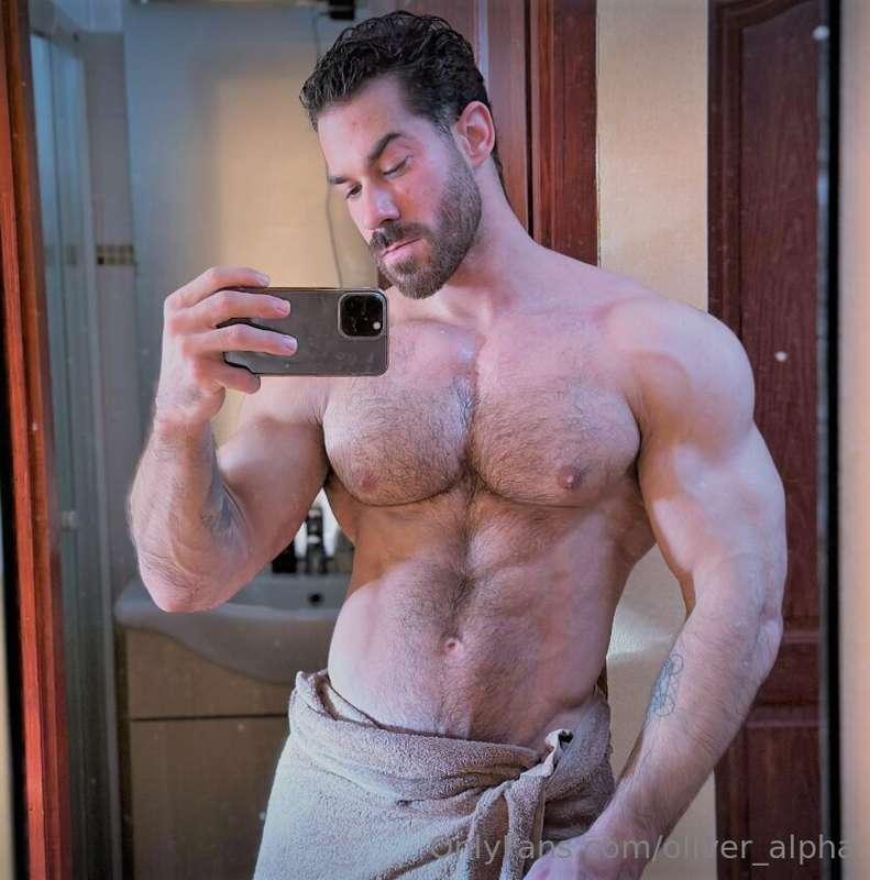 Fresh from the bath, towel barely holding me back… cock hard..