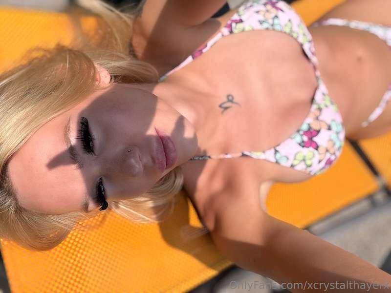 Soaking up the morning sun in my favorite butterfly bikini. ..