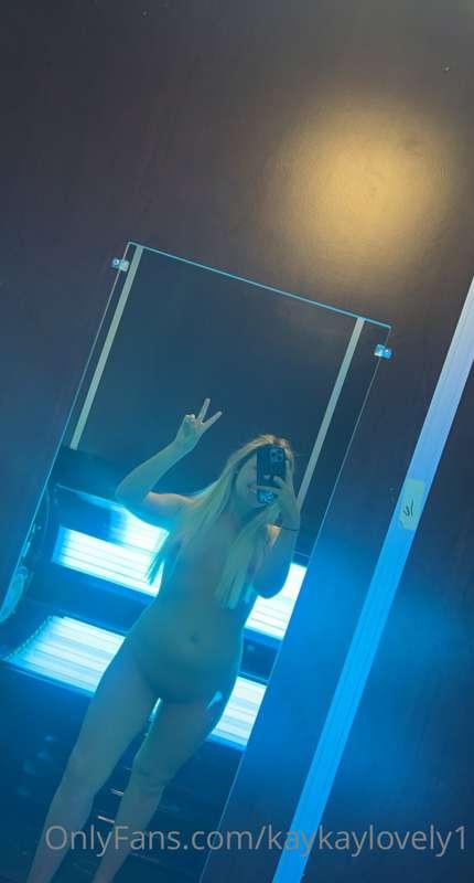 laying in the tanning bed! trying to get my body nice and ta..