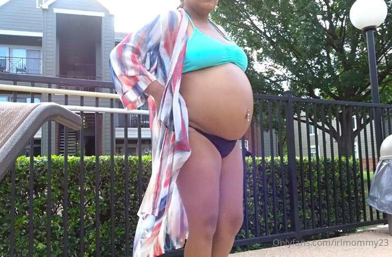 Pregnant bump in bikini outside at the pool 38 weeks pregnan..
