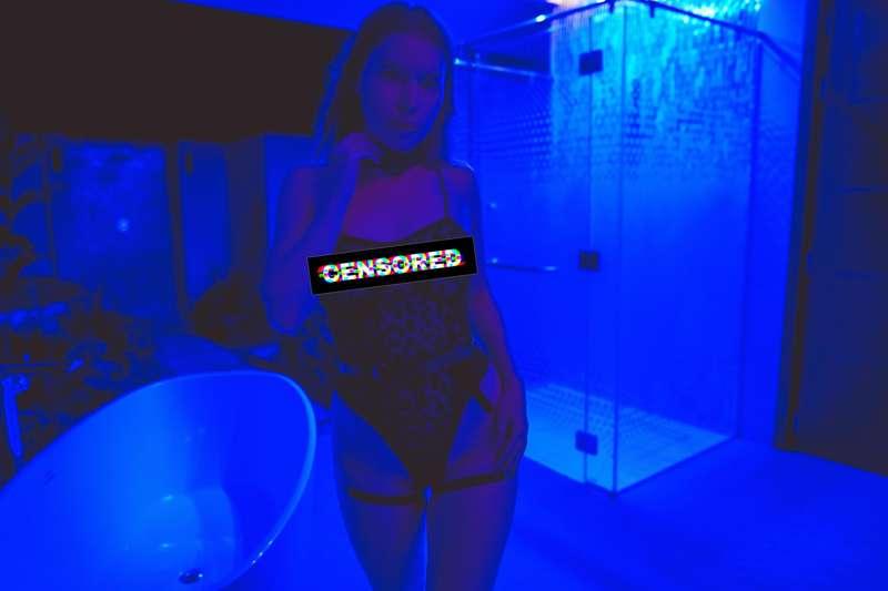 CENSORED NEON PHOTO in bathroom