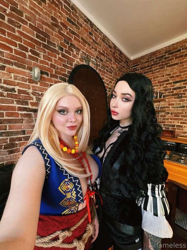 Two powerful sorceresses, one dark and commanding, the other..