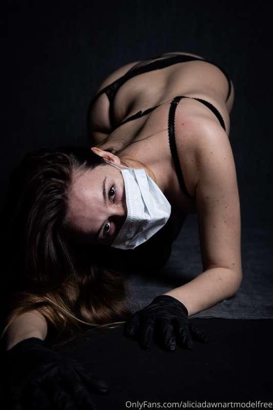 Some photos and a BTS video of me modeling For Blackowl_art ..