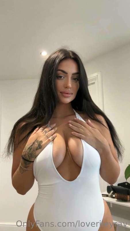 Radiating grace in this white one piece, because confidence ..