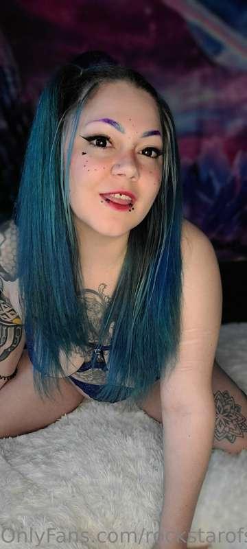 Pigtails and blue, a lovely combination.