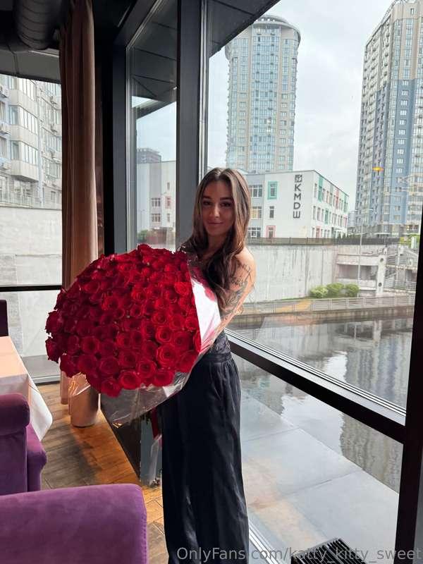 A large bouquet of scarlet roses is not just a floral fragra..