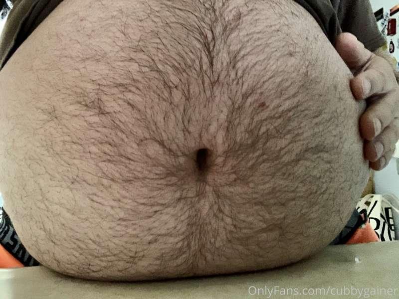 Belly on the kitchen counter.