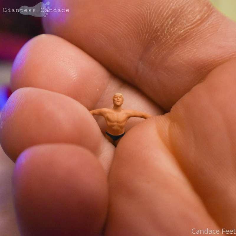 Playing with a helpless tiny while watching TV. Look how muc..