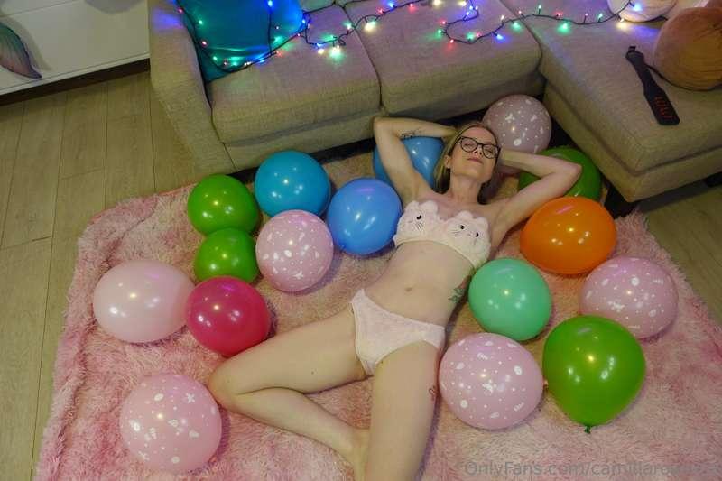 Having fun in the middle of all the balloons! :D