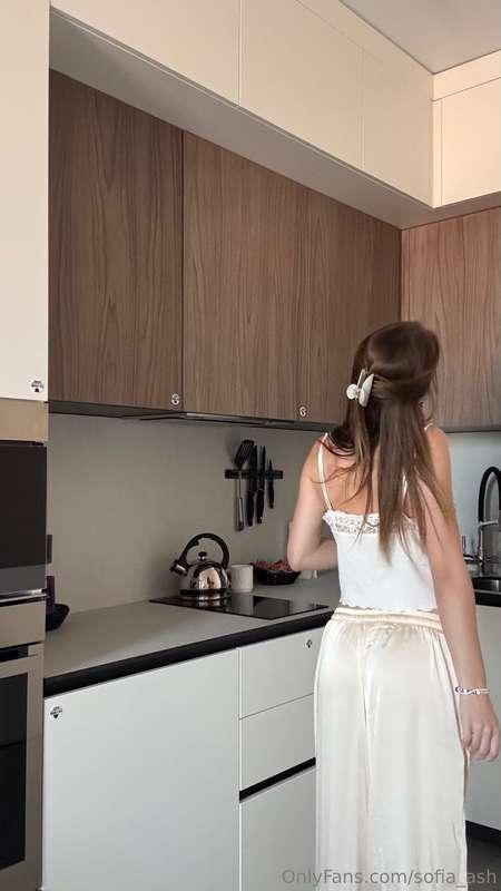 Back turned, holding a berry in my hand 🍓🙈It’s red, sweet, a..