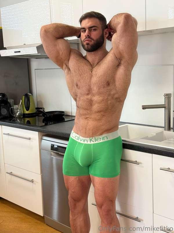 Flexed and hard in the kitchen, abs cut, cock straining thro..