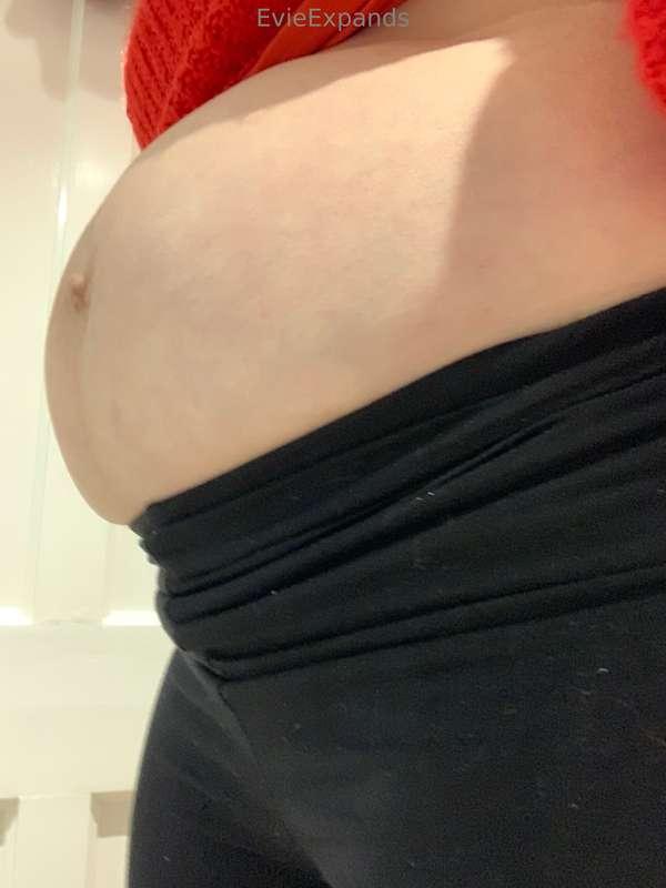 My round little knot of a belly button popping out to say he..