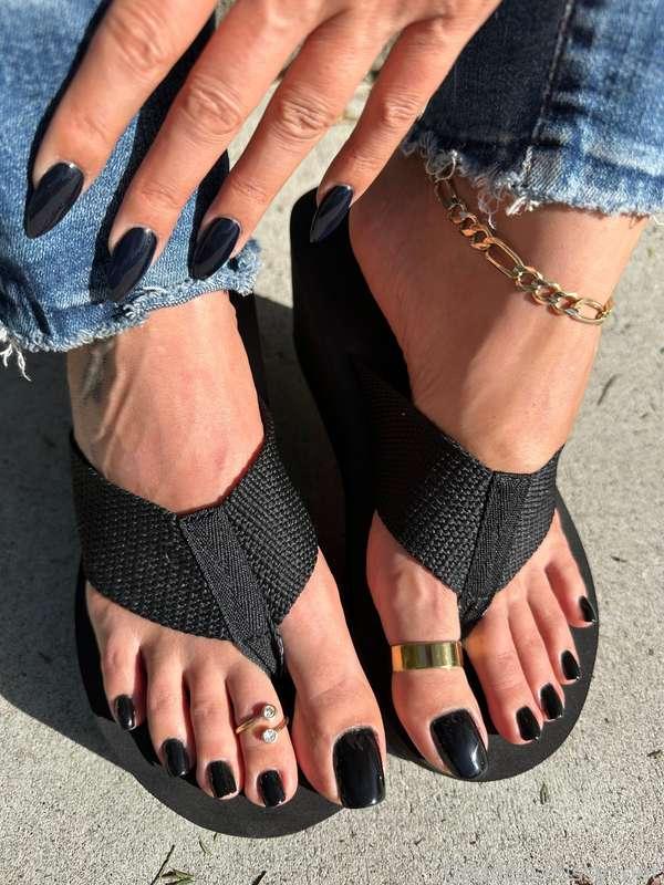 Black wedges and black toes and gold jewels 