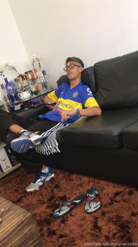 my cousin sitting on the sofa in the room after tee sucked m..