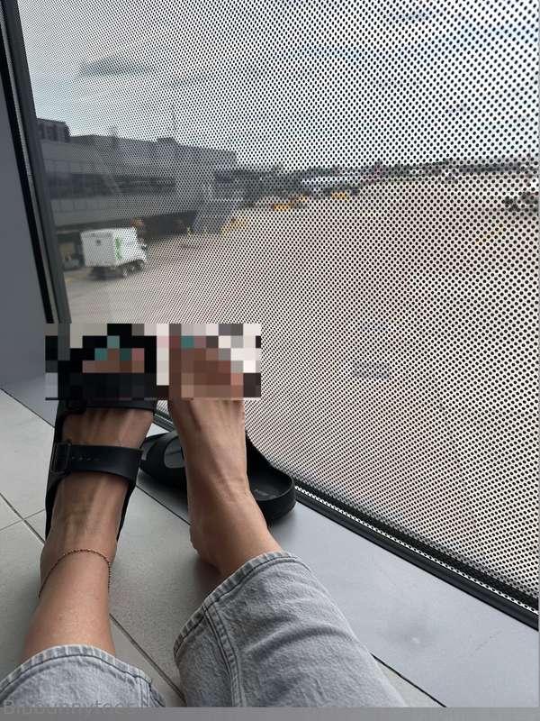 Mini airport photo shoot, smudged polish, dirty soles and al..