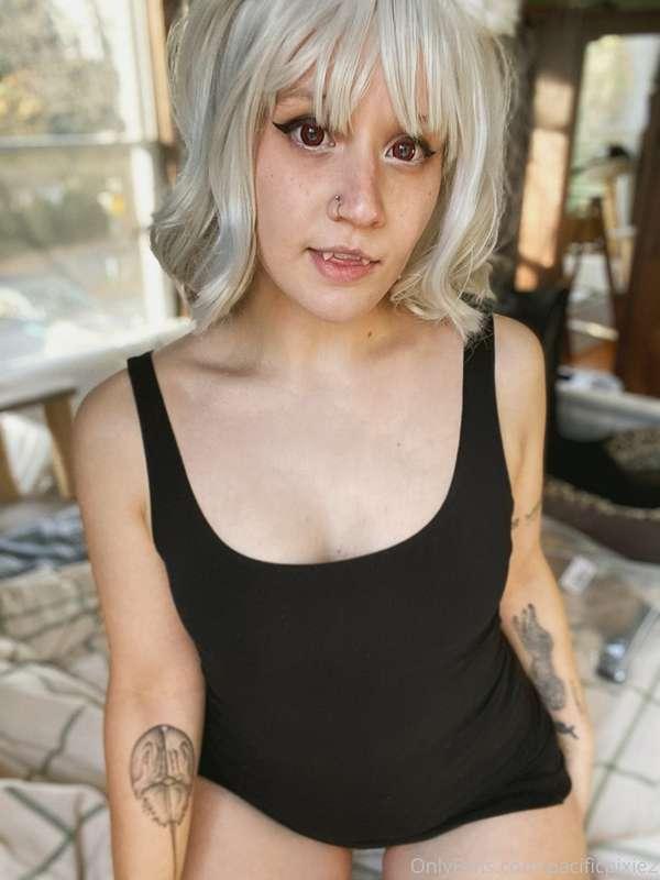 Pitou in (and out of) a tight black mini dress. One of my mo..