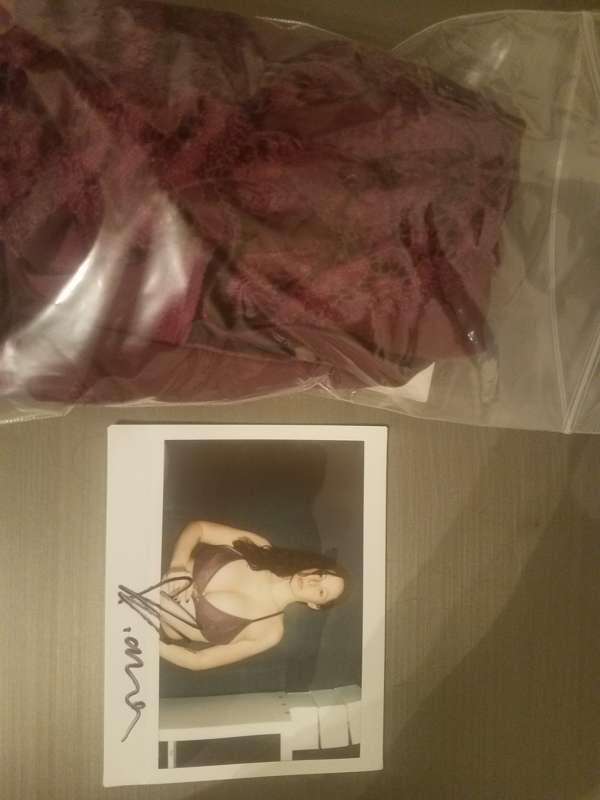 Burgundy  bra.
https://www.mysexyauctions.com/model/gianna-m..