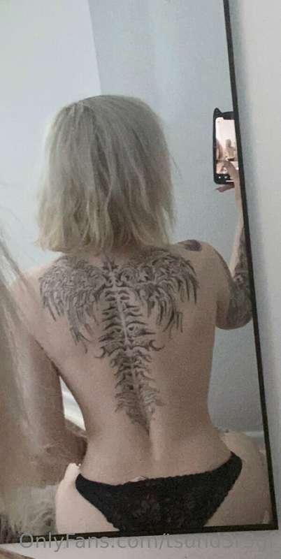 new back tat (not done)