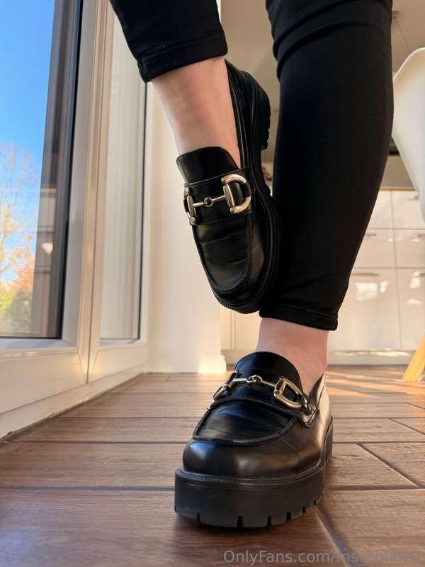 After a long walk, I take off my loafers. My bare soles are ..