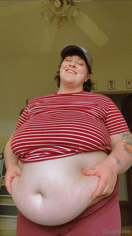 The face of a happy, full woman